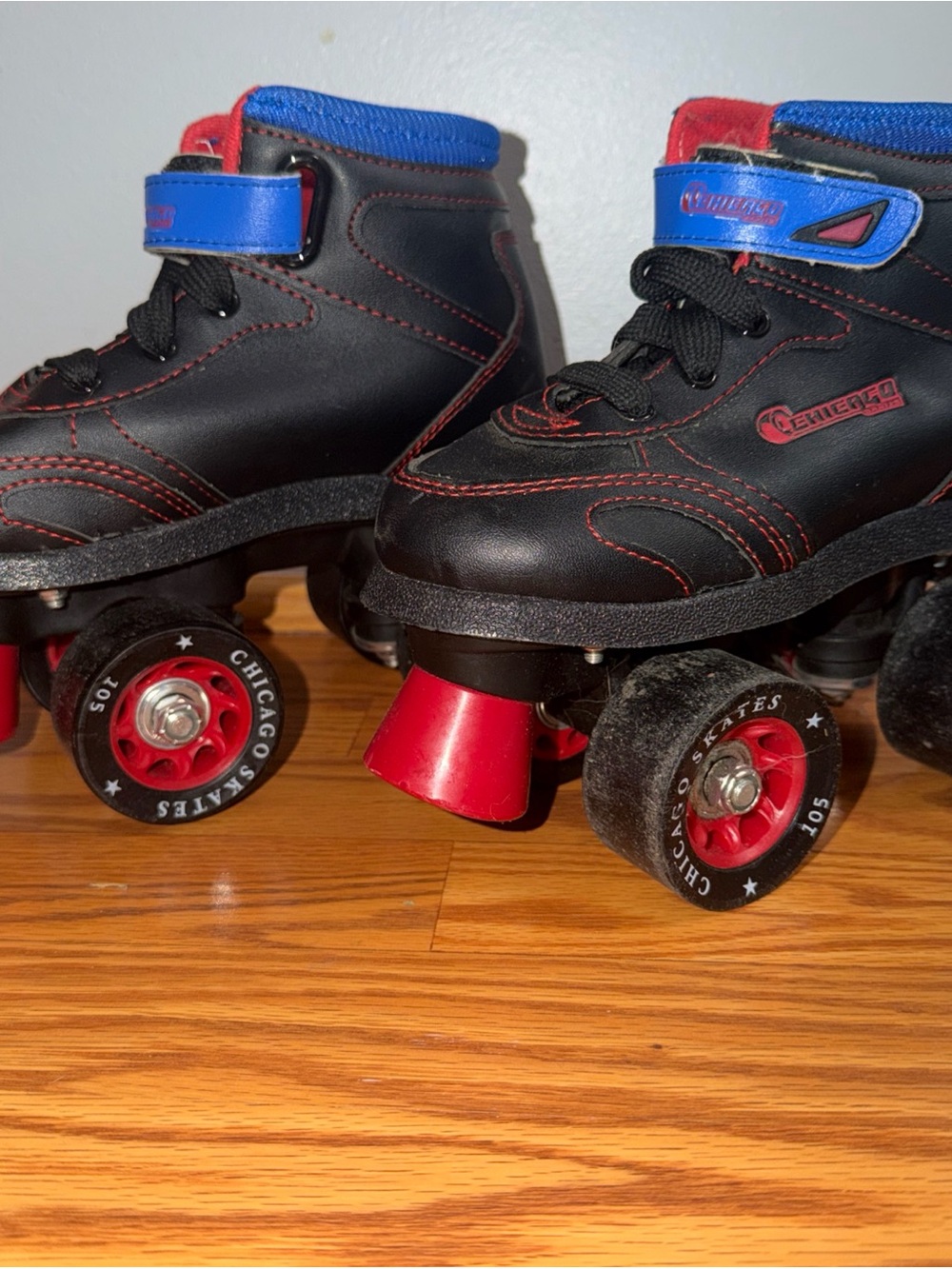 Kids Black and Red Quad Roller Skates with Blue Trim - Comfort Fit